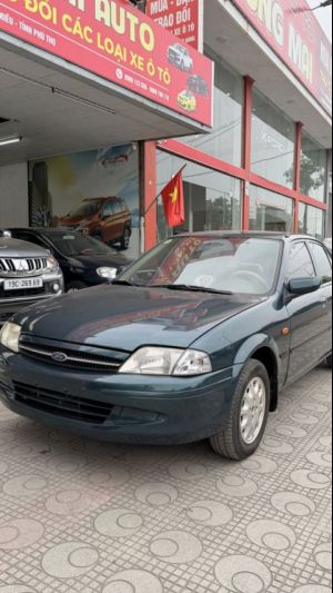 Xe Ford Laser Deluxe 1.6 MT