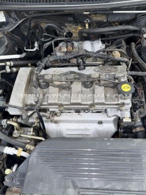 Xe Ford Laser GHIA 1.8 AT